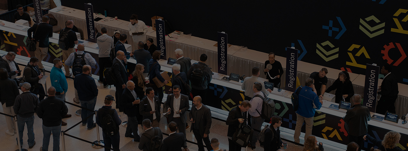 Attendees line up to enter MD&M Midwest