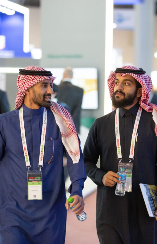 A man and woman at the MEOS GEO 2023 exhibition