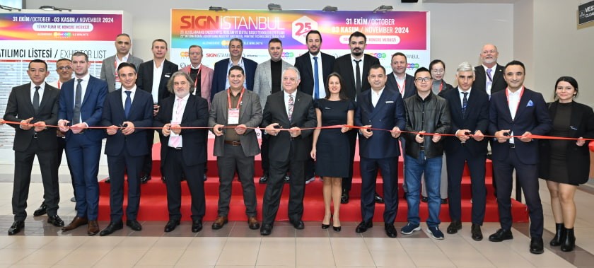 Visitors participating in the Wheel of Fortune at SIGN İstanbul