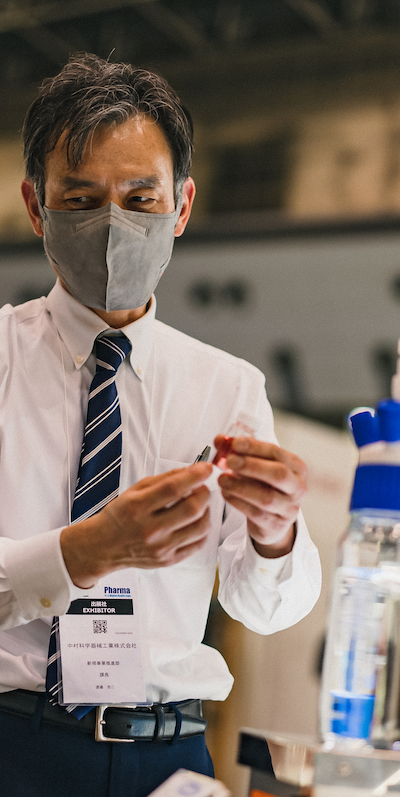 Male professional showcasing pharma products