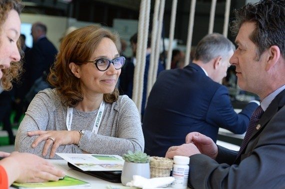 chatting at Vitafoods Europe event